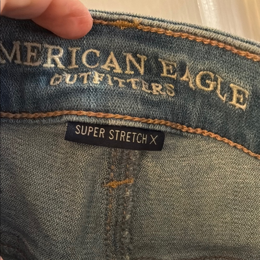 American Eagle 🥳HP🥳Outfitters Blue Skinny Distressed Jeans - Picture 7 of 12